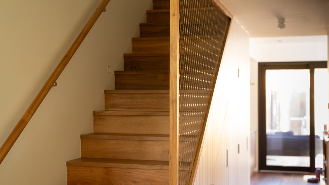 Hallway entrance of Passive House showing sun access strategies for natural light